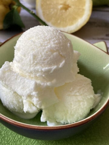 lemon gelato scoops in a bowl, authentic Italian homemade recipe
