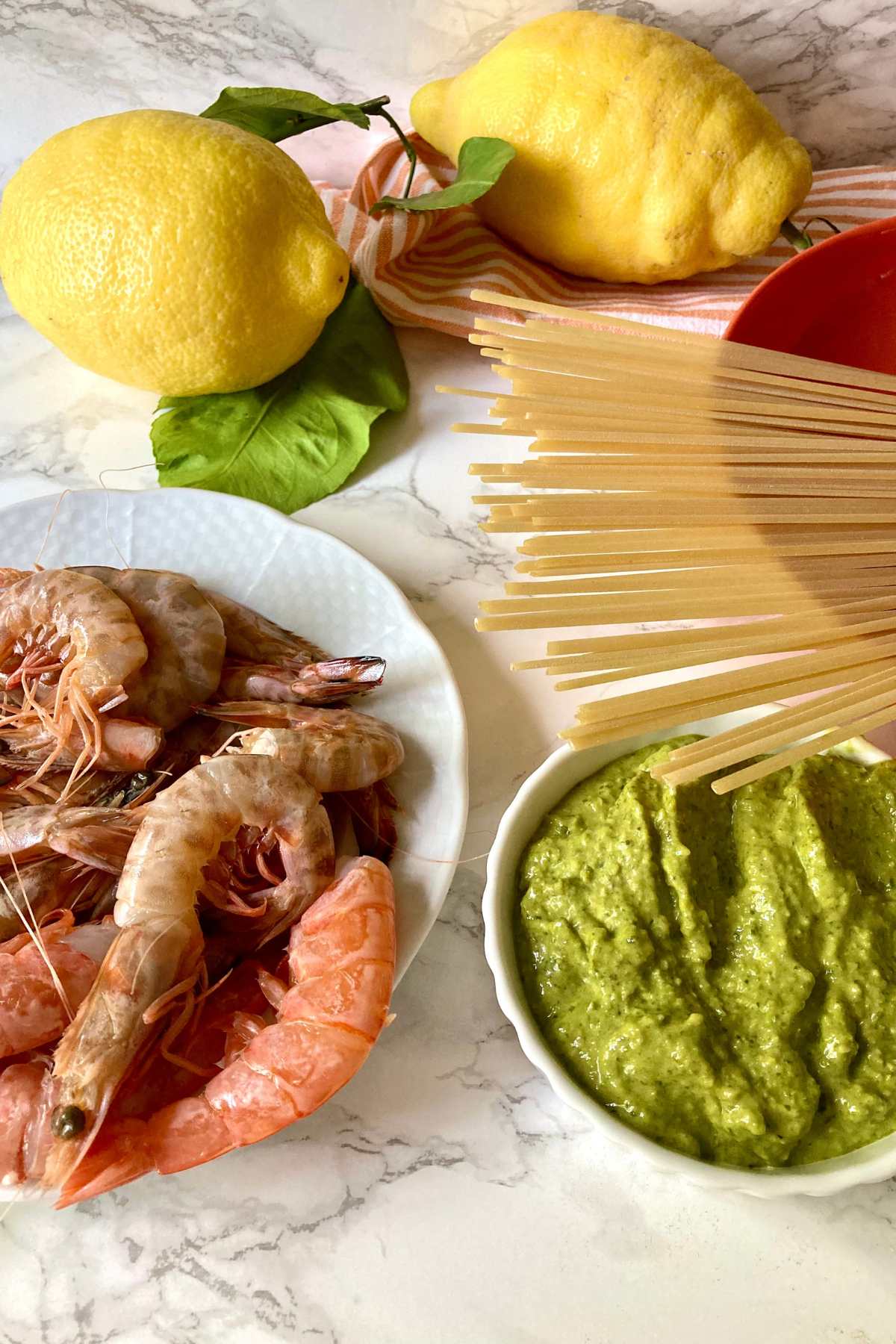 ingredients for shrimp tartare pasta with pesto and lemon