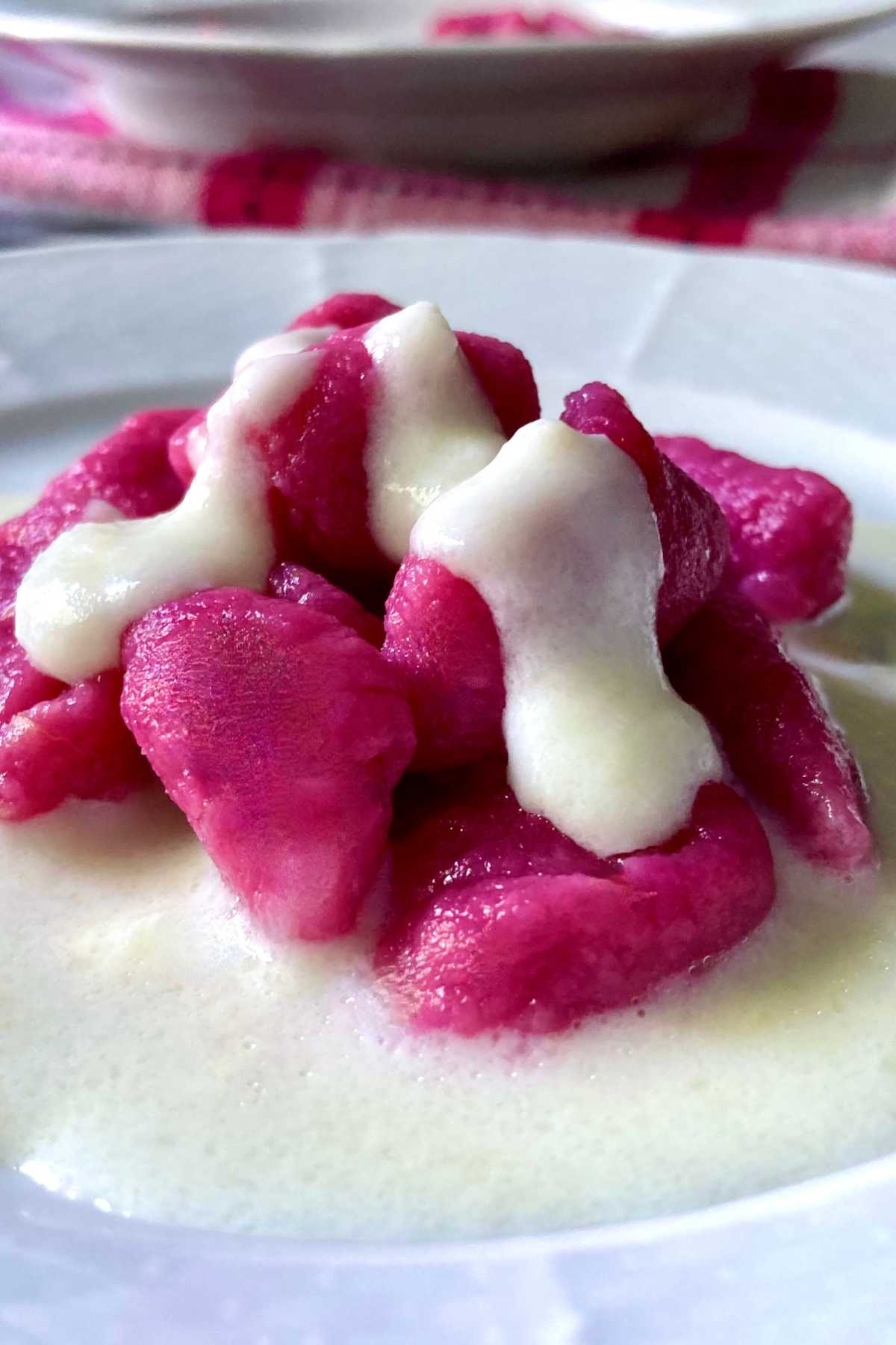 beet gnocchi with taleggio cream