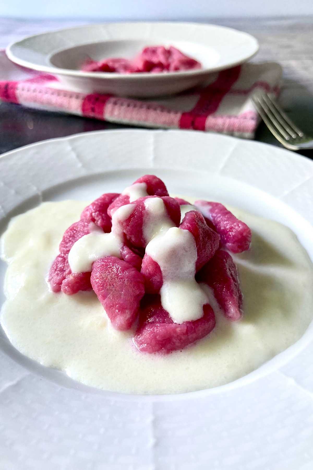 beet gnocchi with taleggio cream