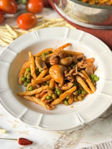 strozzapreti with cuttlefish and peas