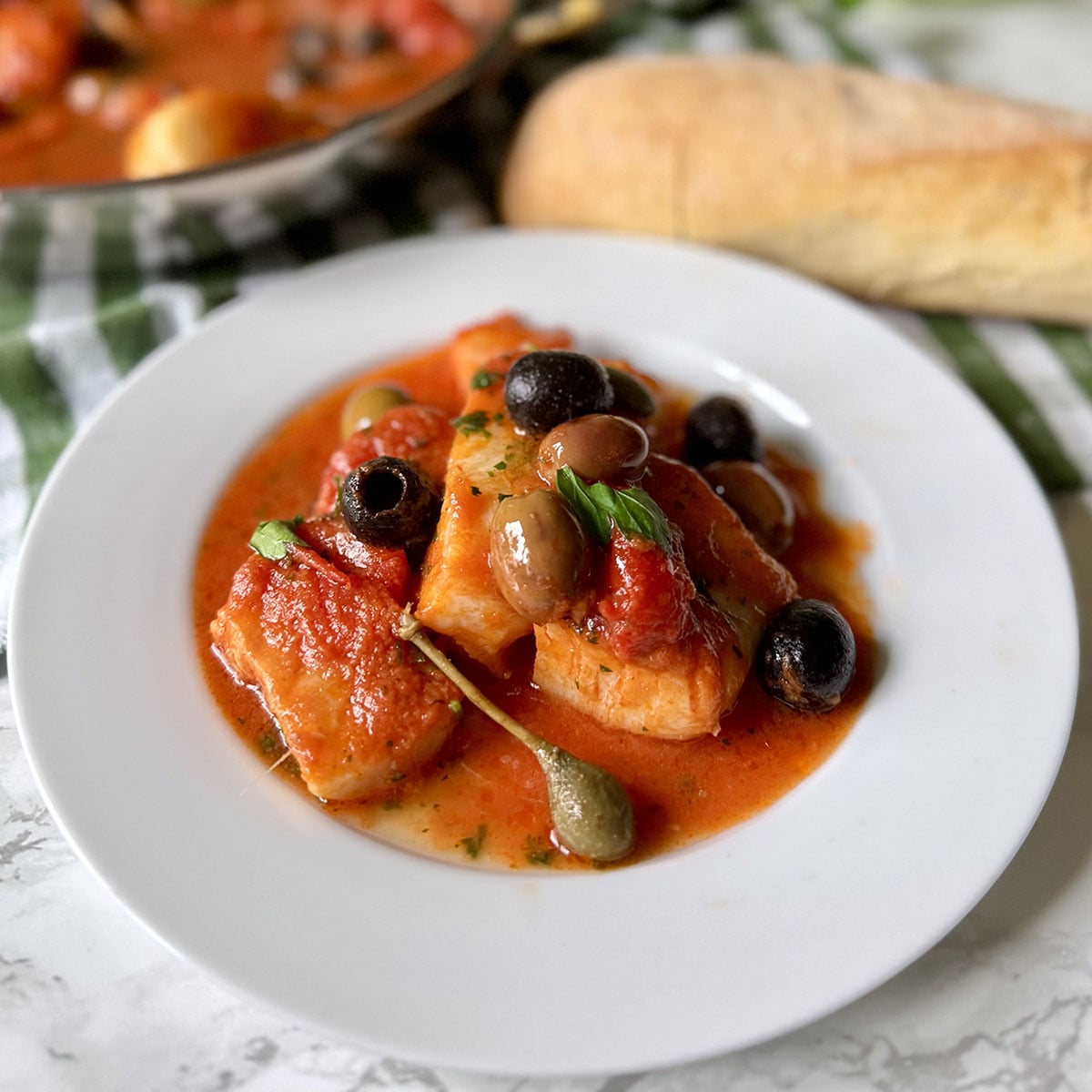 Baccalà alla Puttanesca (Italian Salt Cod in Puttanesca Sauce)