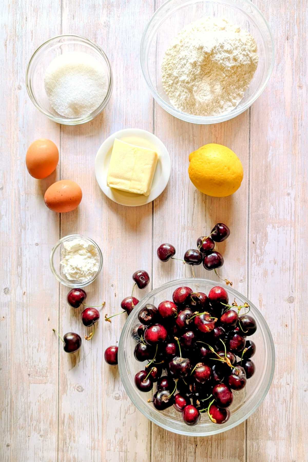 Ingredients for fresh cherry crostata with pasta frolla