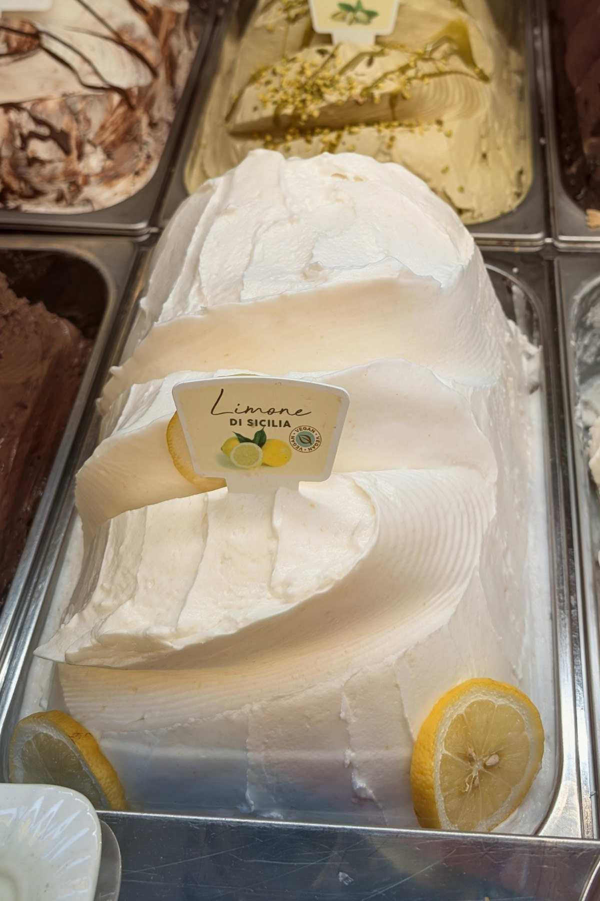close up of lemon gelato in a traditional Italian gelato shop