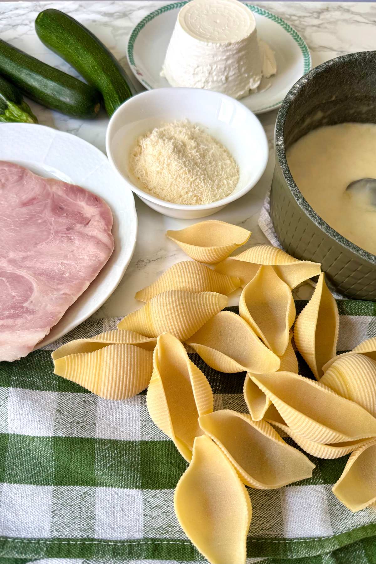 ingredients for baked pasta shells with ricotta and zucchini